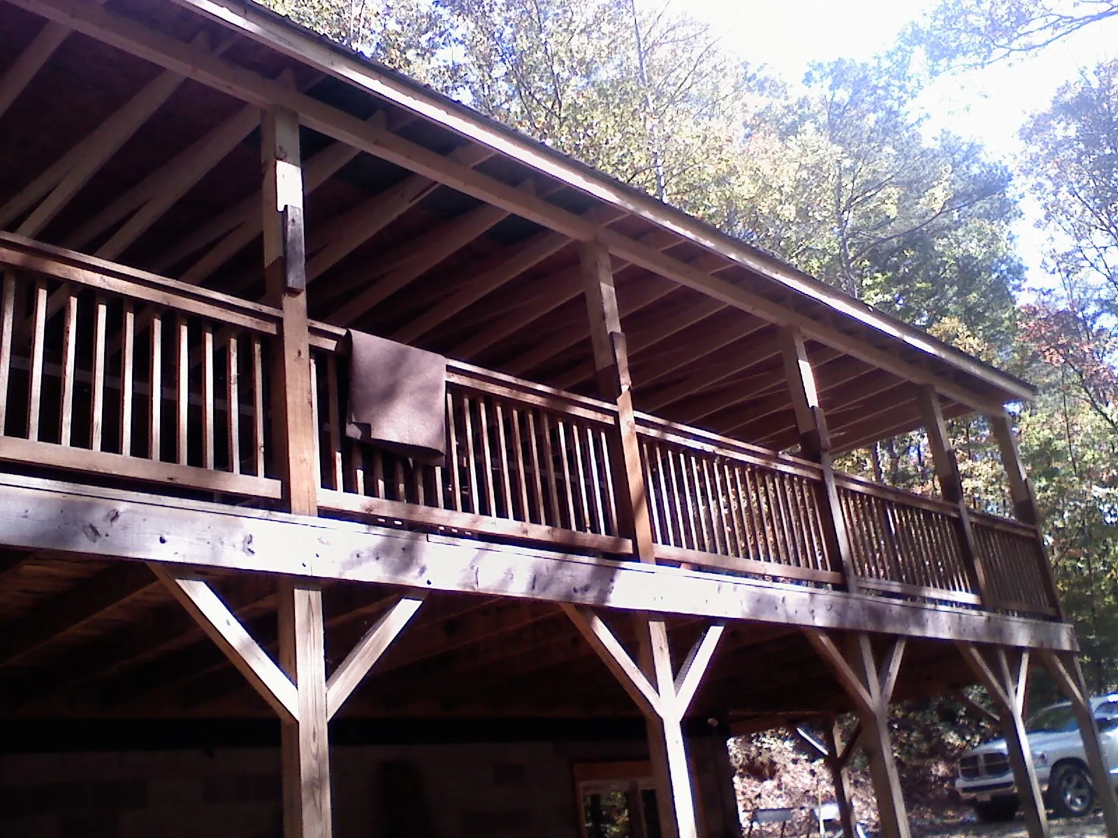 Timber framing under a new elevated porch and deck — Roof Leak Repair in Manton by Roofing Brothers